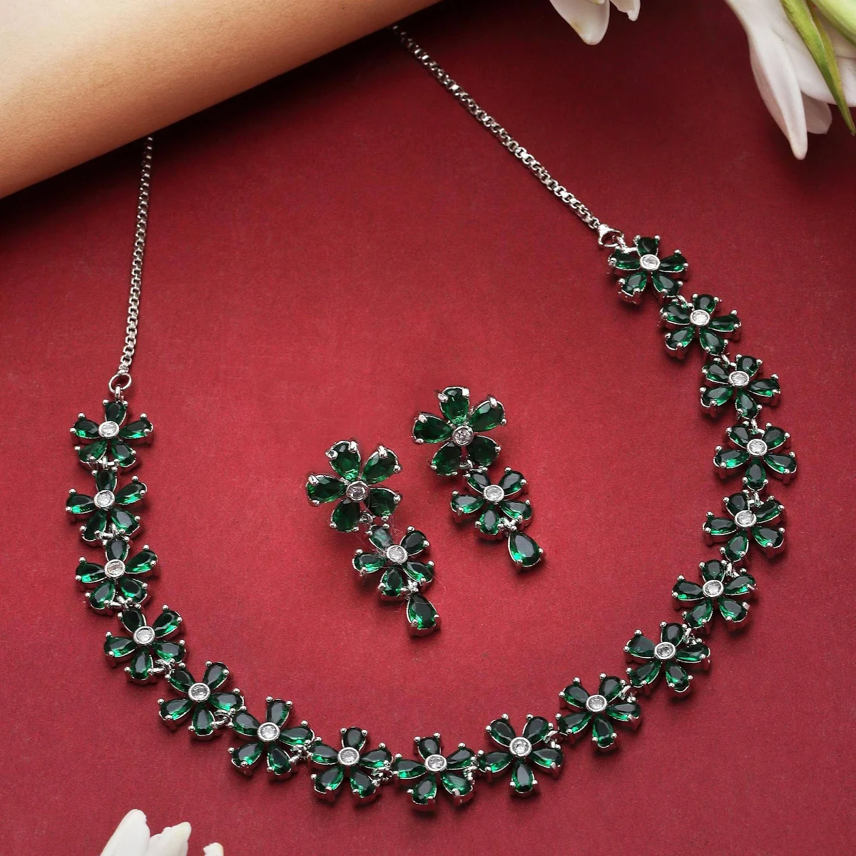 ZENEME Rhodium Plated Silver Toned White American Diamond Studded Flower Shaped Jewellery